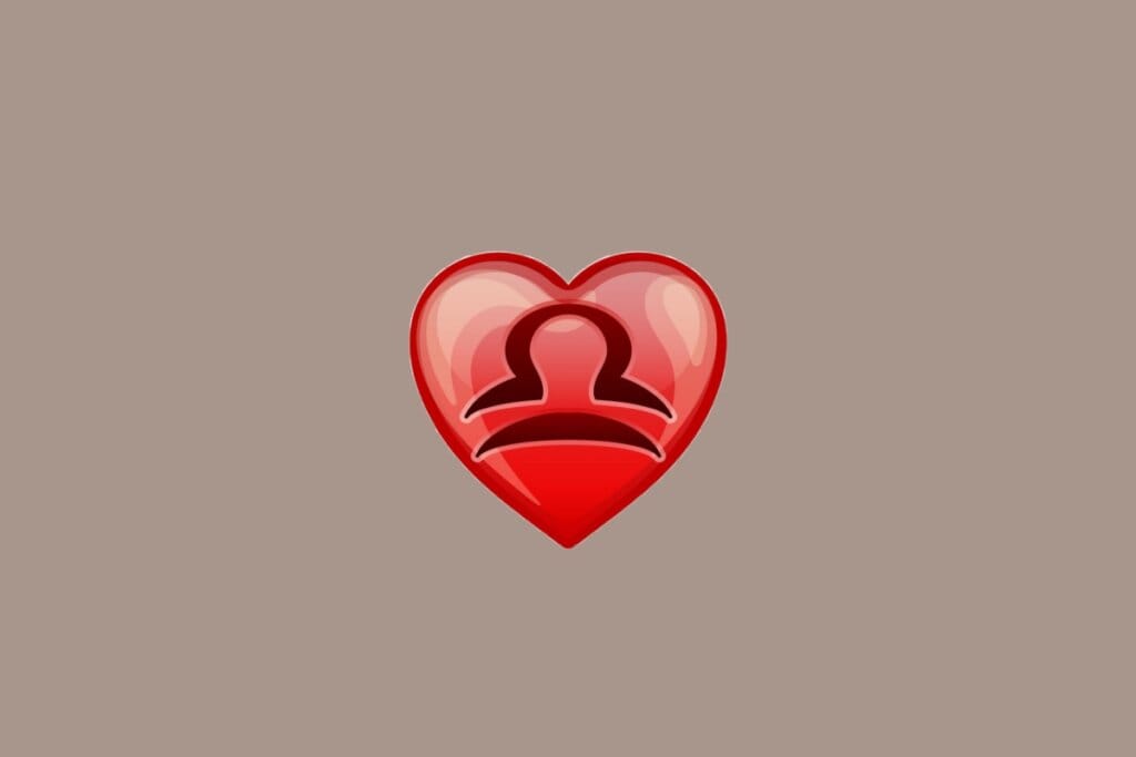 Ilustração do signo de Libra, em fundo amarronzado, com um coração vermelho ao centro contendo uma linha curva sobre uma linha reta