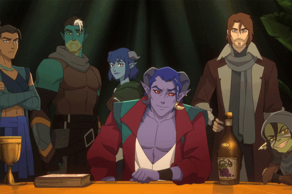 Ilustração de um grupo com 6 pessoas, com aparência humana e de monstro, um deles está sentado em uma cadeira em uma mesa em um local com fundo escuro