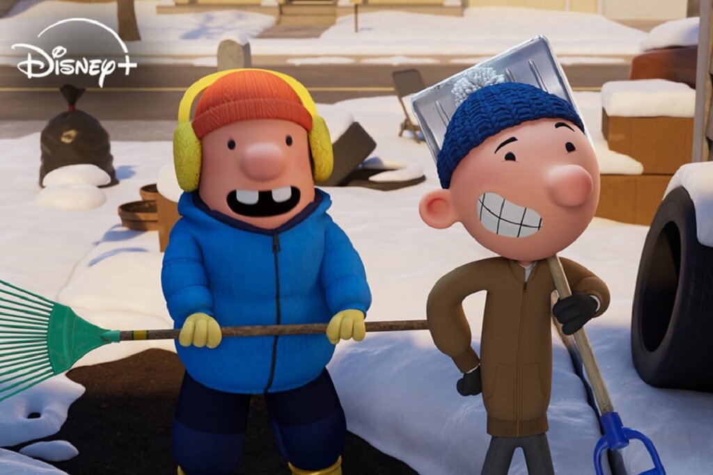 Cena de "Diário de Um Banana: A Gota D'Água" com dois garotos na neve segurando duas pás