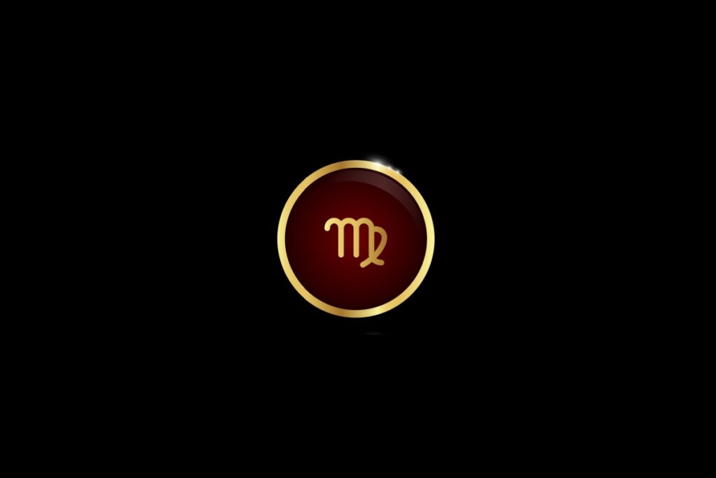 Ilustração do signo de virgem dentro de um círculo dourado, iluminado com uma luz vermelha, em um fundo preto
