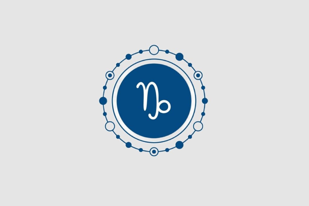 Ilustração do signo de Capricórnio, com símbolo branco em forma de N estilizado com cauda circular, centralizado em um fundo azul-escuro e adornado com círculos ao redor
