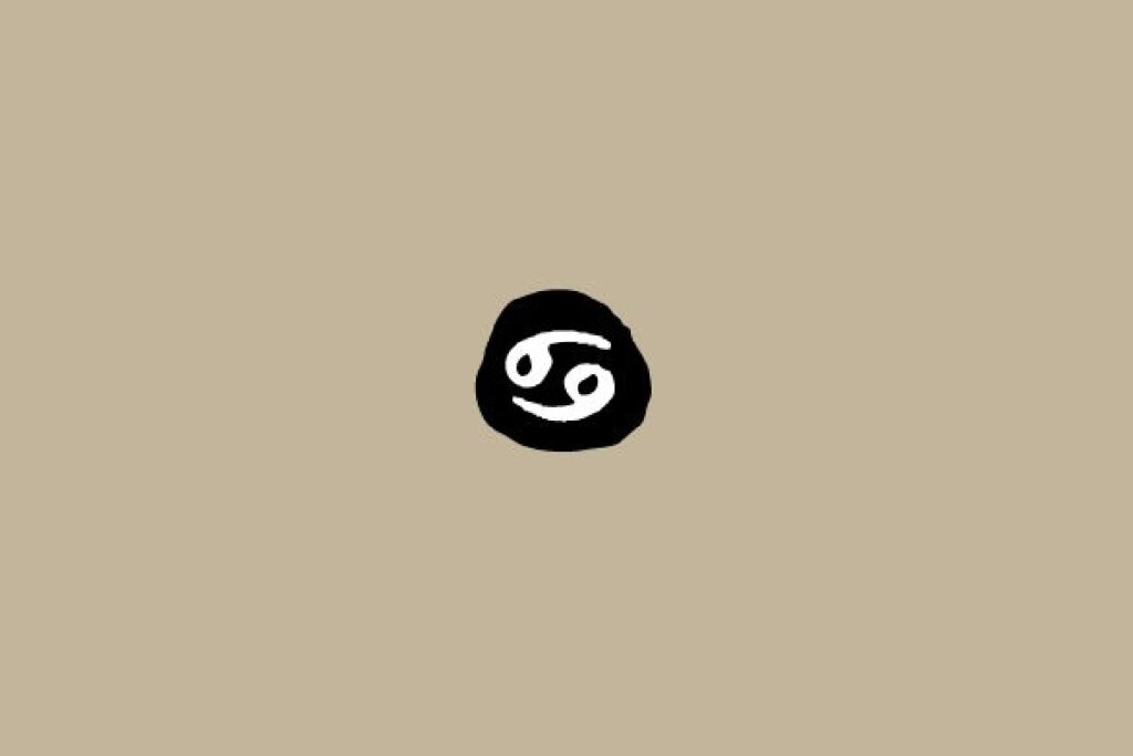 Símbolo do signo de Câncer em branco dentro de um círculo preto sobre um fundo bege