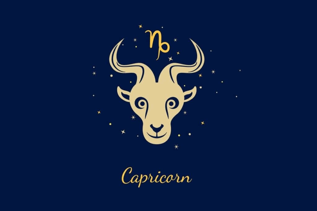 Um fundo azul-marinho escuro com ilustração estilizada da cabeça de uma cabra com chifres curvados. Acima dela, está o glifo de Capricórnio em dourado vibrante. Abaixo, o texto "Capricorn".