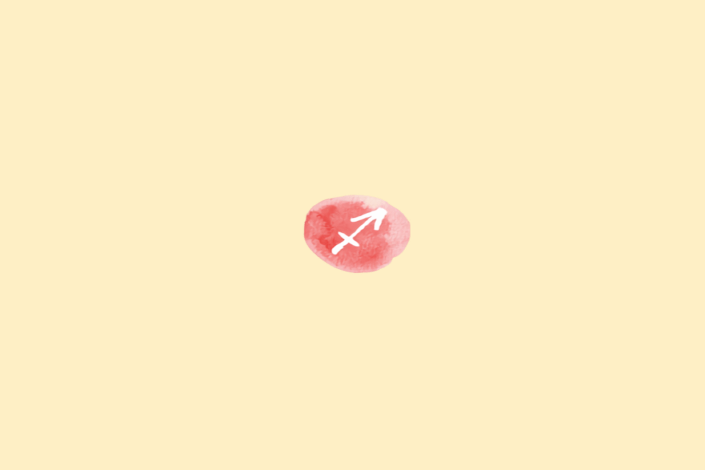 Símbolo do signo de Sagitário em branco dentro de círculo vermelho em fundo amarelo