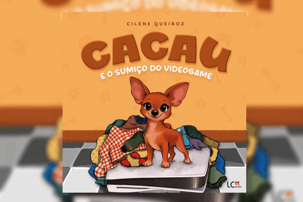 Capa de livro laranja com título e nome do autor escrito em marrom e branco e ilustração de cachorrinha marrom em cima de um videogame com roupas por cima