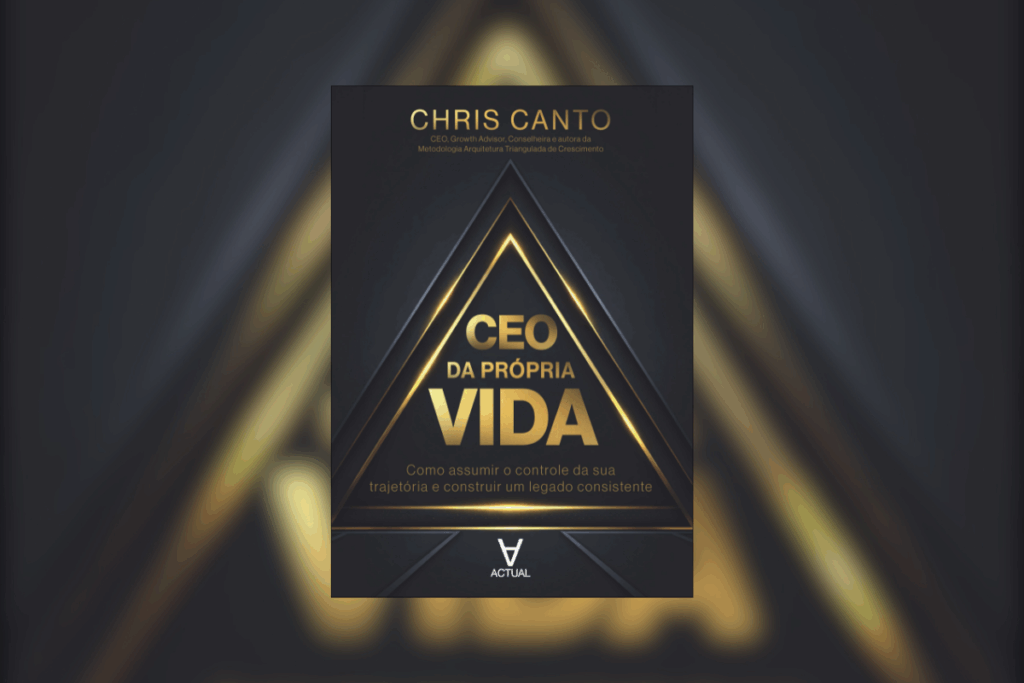 Capa de livro preta com nome, título e pirâmides em dourado