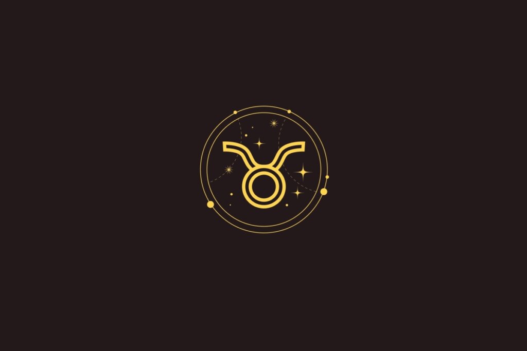 Ícone dourado do signo de Touro com um círculo e chifres curvados, cercado por um círculo com detalhes de estrelas sobre fundo preto