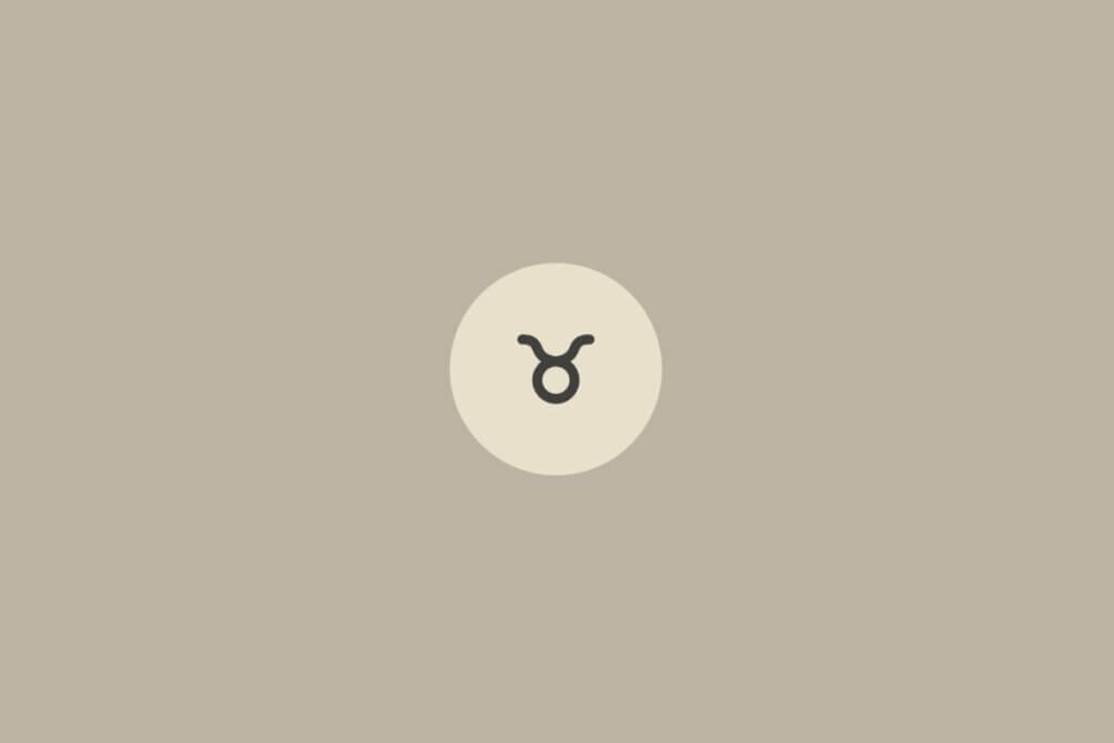Imagem minimalista com fundo bege claro e o símbolo do signo de touro centralizado dentro de um círculo em tom mais claro