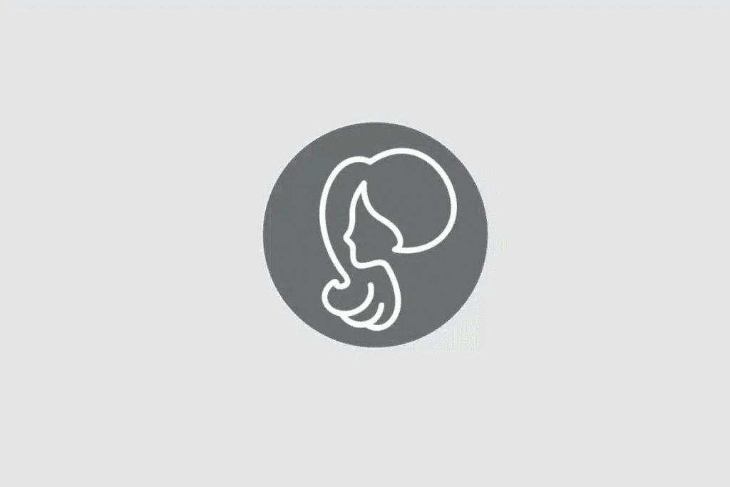 Ilustração do signo de Virgem contendo o perfil de uma figura feminina de cabelos longos, em fundo cinza