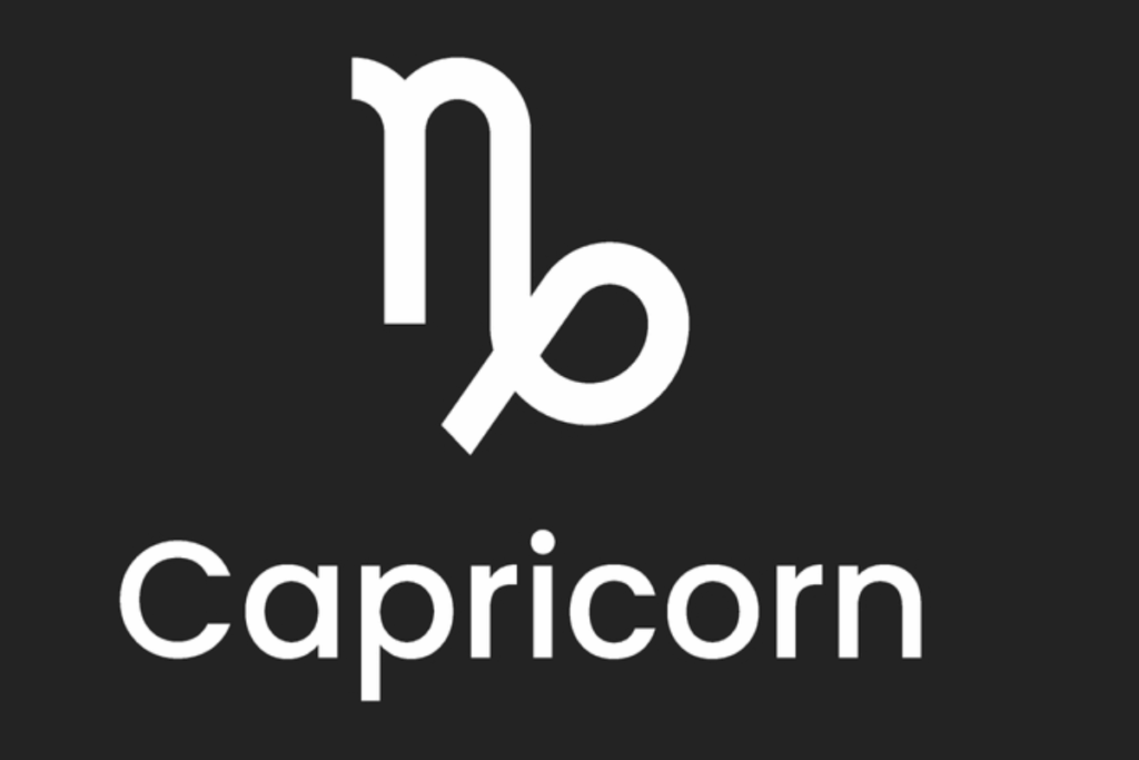 A imagem apresenta o símbolo astrológico e o nome do signo de capricornio em branco, centralizado sobre um fundo liso em tom cinza-escuro, quase preto