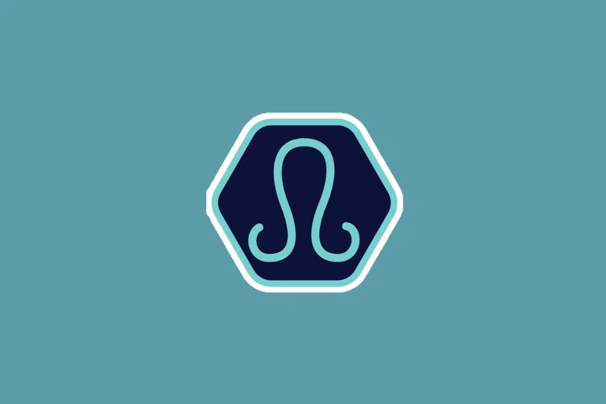 Ilustração minimalista do símbolo do signo de libra em tom azul-claro, centralizada dentro de um hexágono azul-escuro com borda branca e azul. O fundo da imagem é em um tom sólido de azul-turquesa