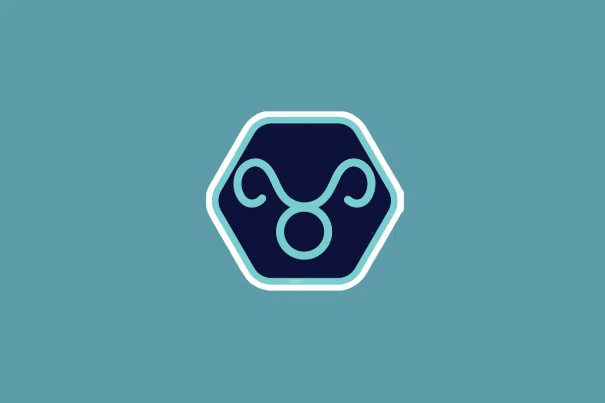 Ilustração minimalista do símbolo do signo de touro em tom azul-claro, centralizada dentro de um hexágono azul-escuro com borda branca e azul. O fundo da imagem é em um tom sólido de azul-turquesa